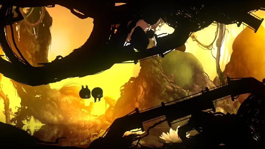 BADLAND gameplay, a black silhouetted creature flying through a dense backlit forest of moving machinery.